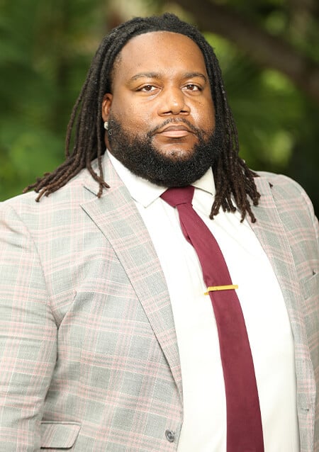 Malcam Godwin Esq